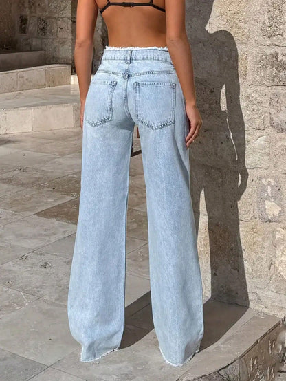 Pantalones con diseño desilachado